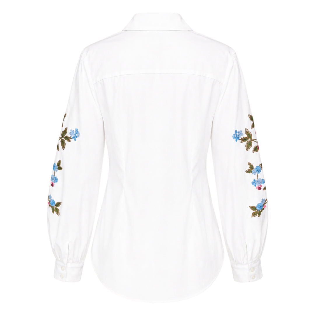 Carolina Herrera white button-down shirt with multicolour floral embroidery on voluminous puff sleeves, featuring a point collar and mother-of-pearl buttons