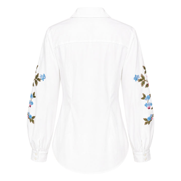 Carolina Herrera white button-down shirt with multicolour floral embroidery on voluminous puff sleeves, featuring a point collar and mother-of-pearl buttons