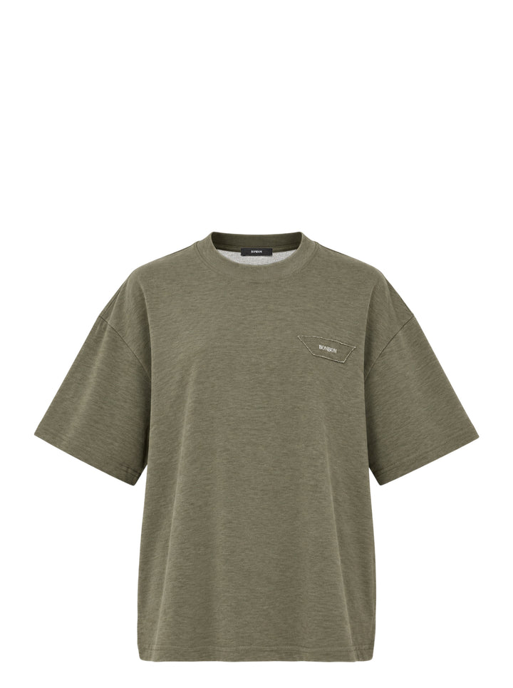 Bonbom olive green heathered oversized t-shirt with a raw-edge trapezoid logo patch at the chest, shown from the front