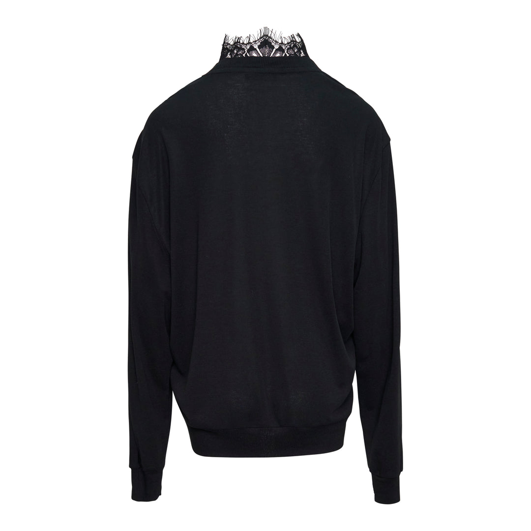 Bonbom Lingerie Neck Sweater in black, featuring a floral lace inset panel at the V-neck and a scallop-edged lace stand collar, with long sleeves and ribbed cuffs and hem