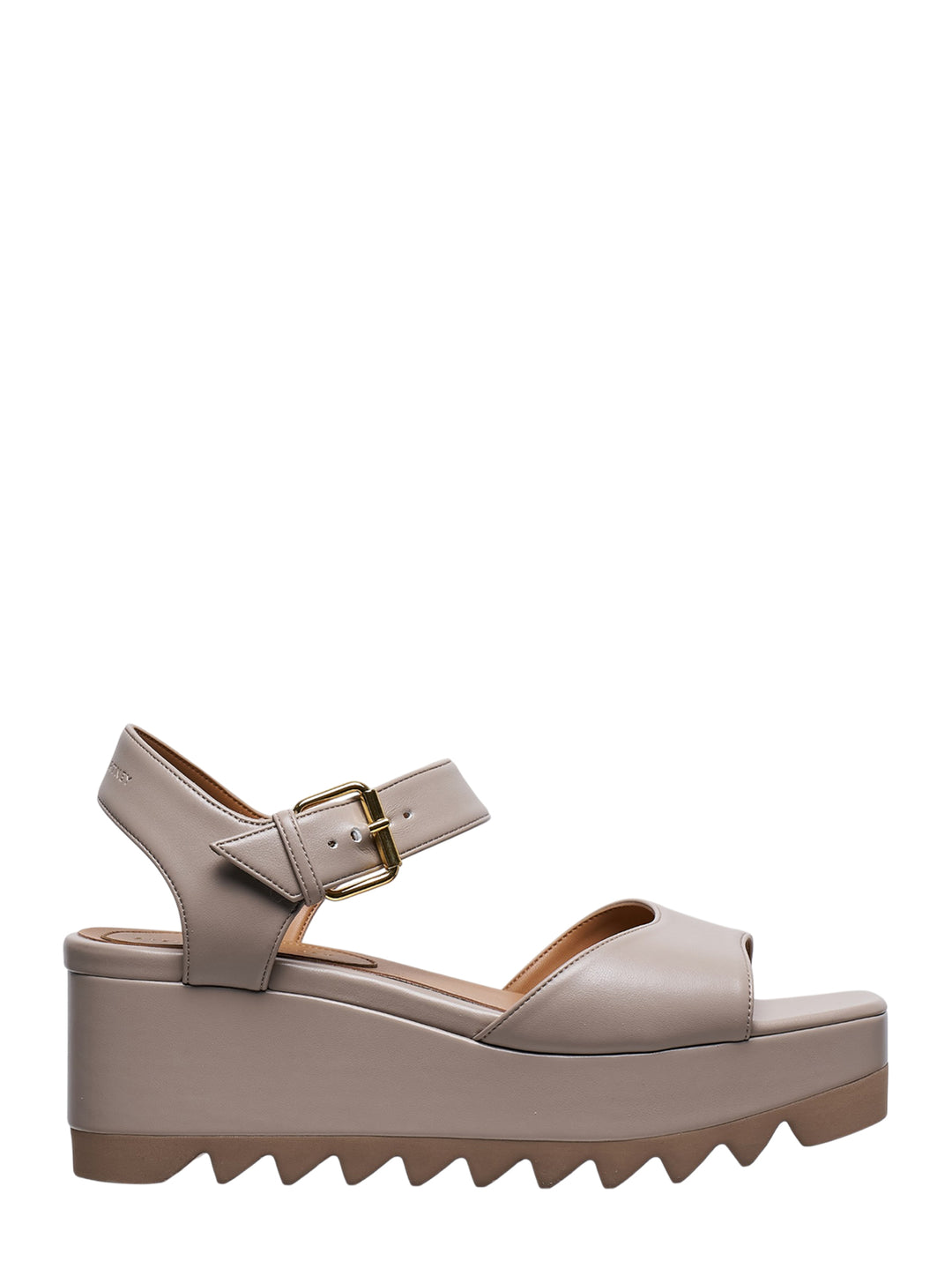 Stella McCartney Elyse Alter Mat flatform sandal in taupe, featuring a wide toe strap, adjustable ankle strap with gold buckle, and signature serrated platform sole, shown in profile view