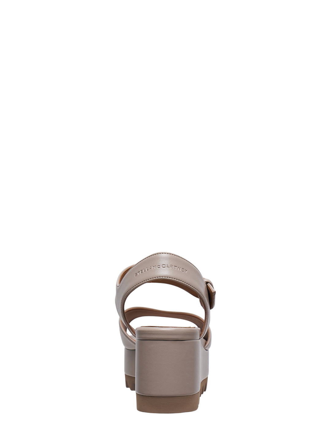 Stella McCartney Elyse Alter Mat flatform sandal in taupe, featuring a wide toe strap, adjustable ankle strap with gold buckle, and signature serrated platform sole, shown in profile view - view 3