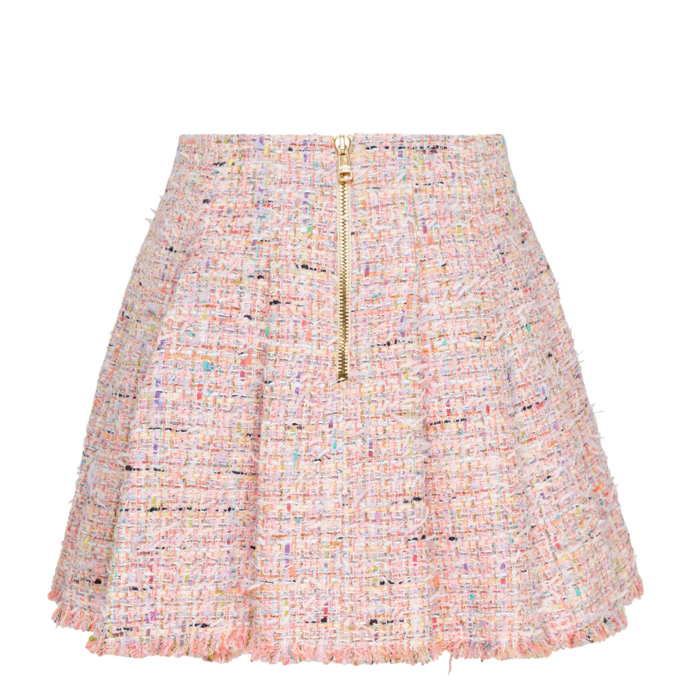 Balmain Multicolour Tweed Flare Skirt with gold lion-head buttons and frayed hem detailing on a white background