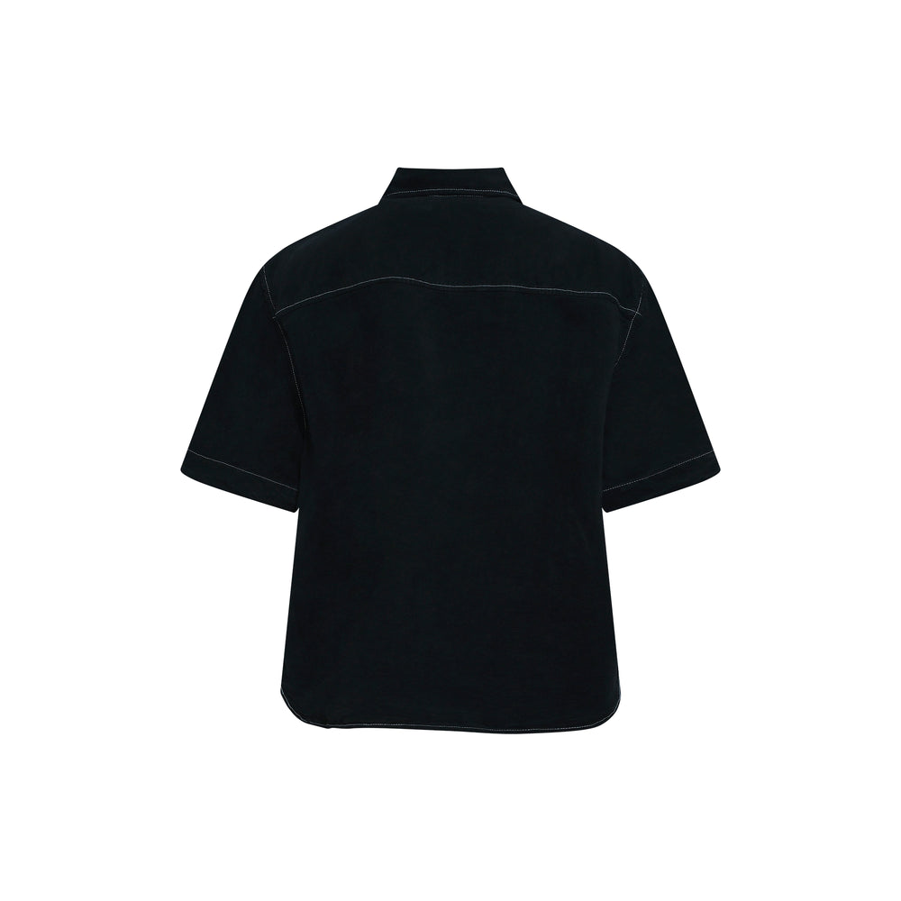 Amiri Script Linen Short Sleeve Shirt in black, featuring contrast white topstitching, a flap chest pocket with cursive script logo embroidery, and a relaxed boxy fit - view 2