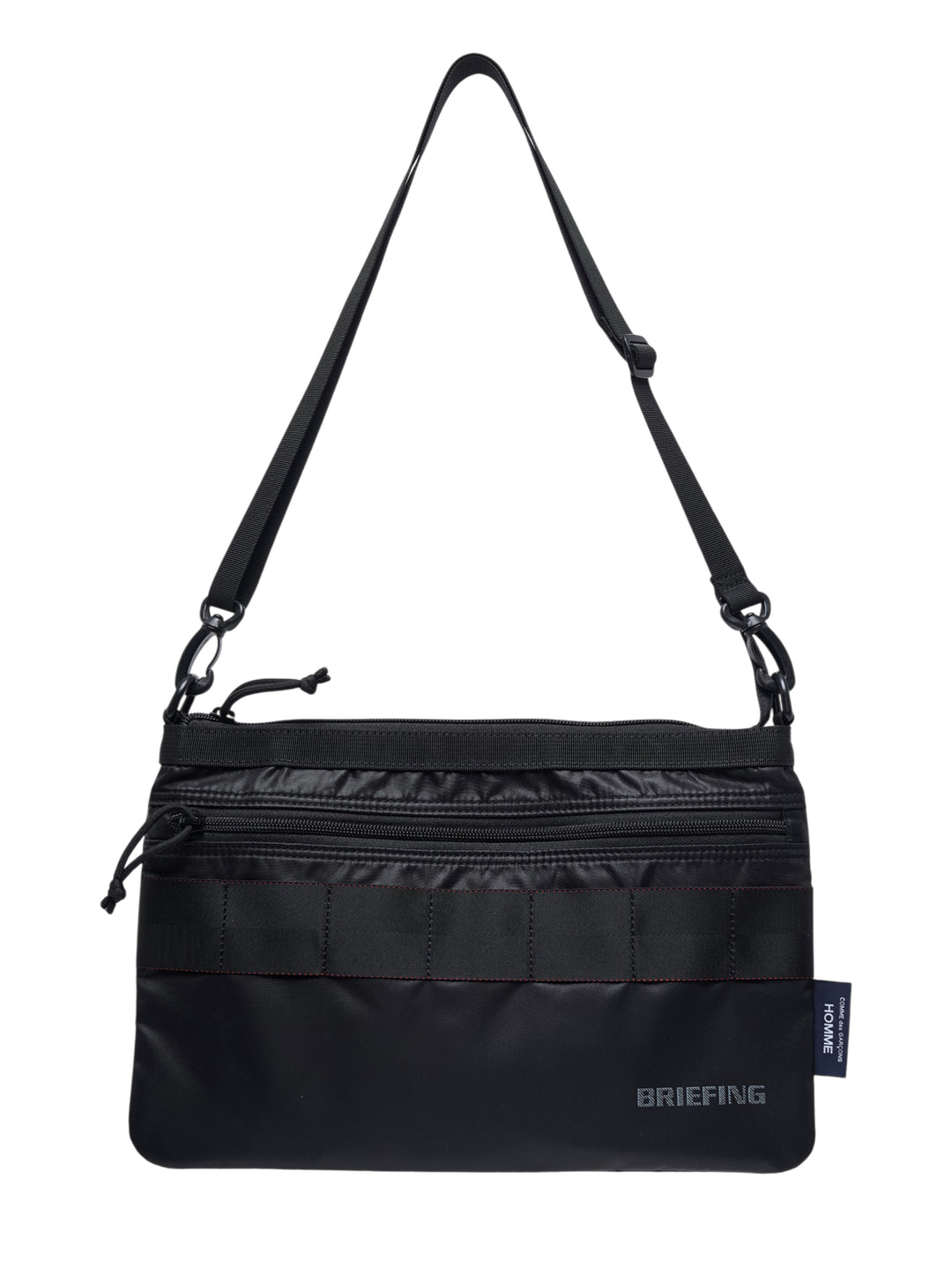 Black nylon duck sacoche crossbody bag with front zip pocket, webbing band, adjustable shoulder strap and Briefing branding