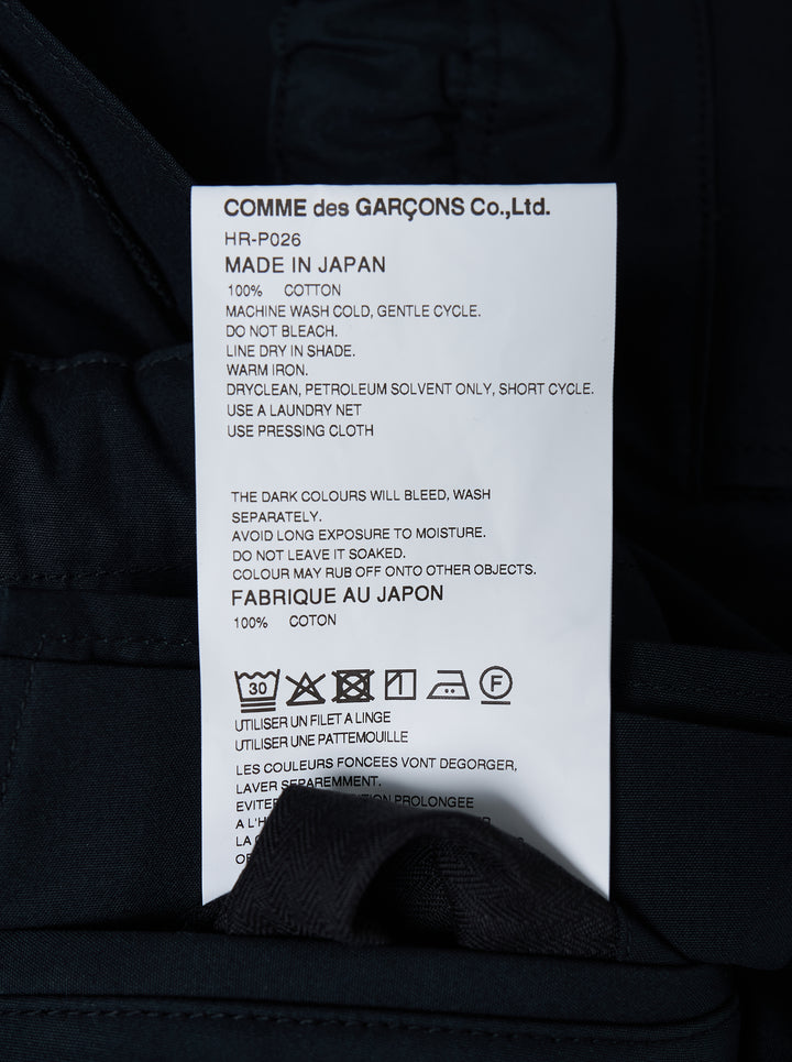 Black wide-leg cotton twill cargo pants with buckle webbing belt and flap utility pockets by Comme des Garçons Homme - view 4