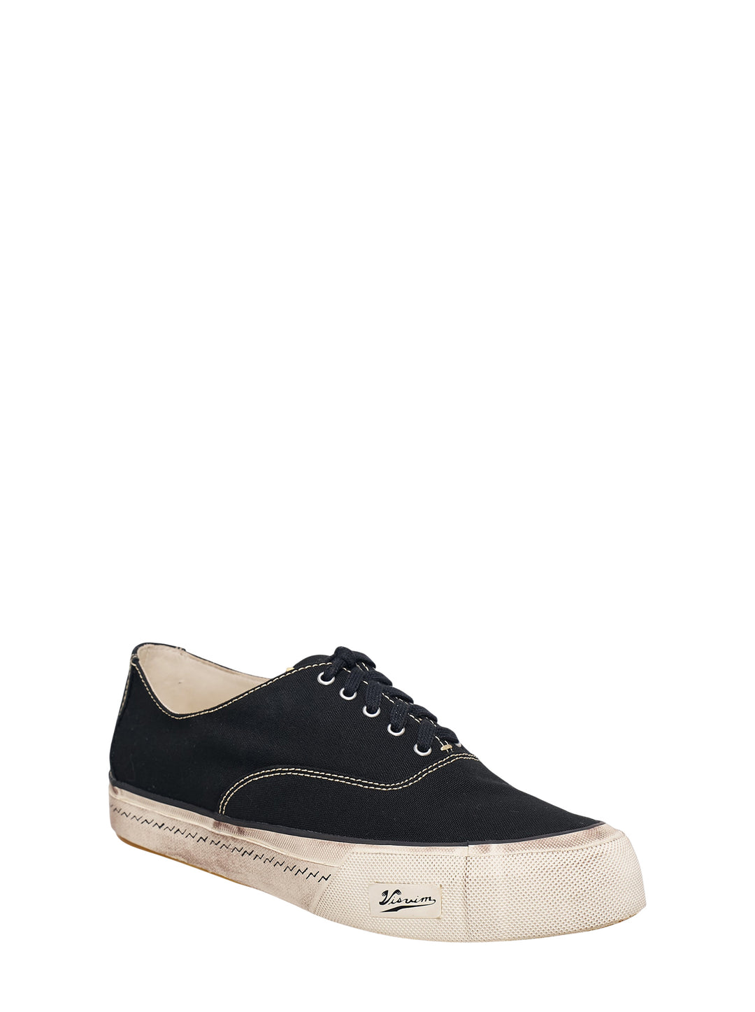 visvim Logan Deck Lo black canvas sneaker with contrast stitching and distressed off-white sole, side view - view 2