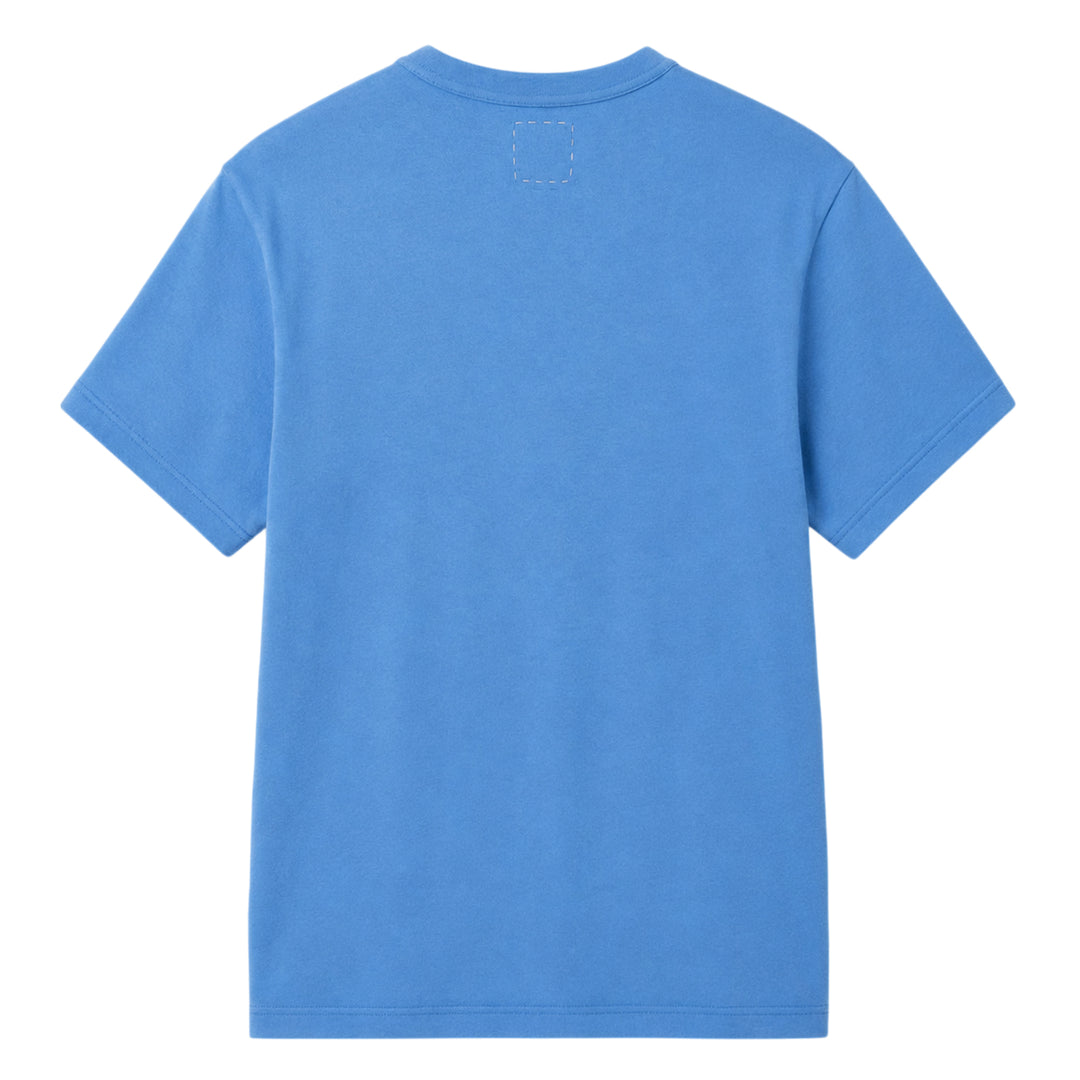 visvim Tiger Man Jumbo Short Sleeve Tee in cornflower blue, featuring a hand-drawn style striped tiger graphic with white script lettering above and below, laid flat on a white background - view 2
