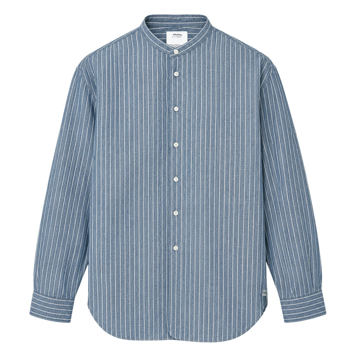 visvim Ingall Long Sleeve Shirt in blue chambray with white pinstripes, featuring a Mandarin band collar, cream button placket, and double-stripe cuff detailing