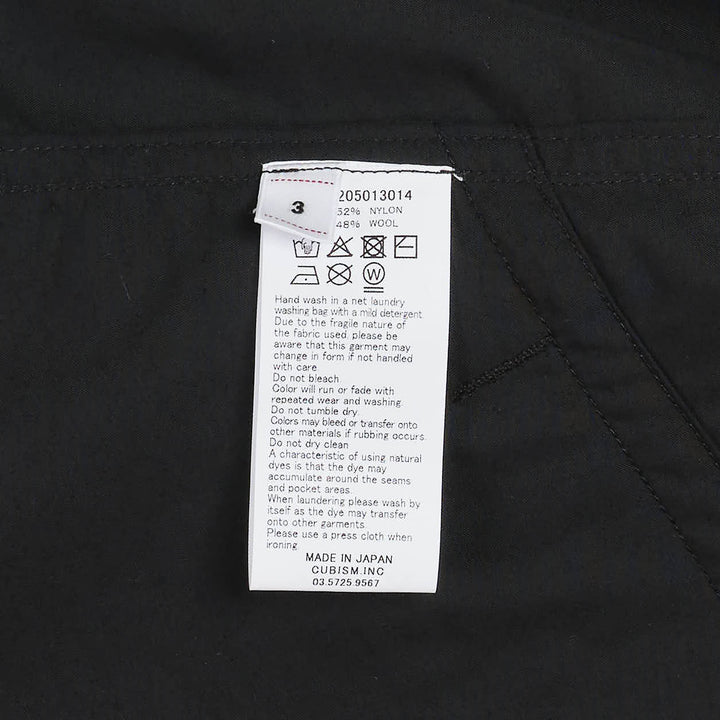visvim Windfall Coach Jacket in black with embroidered Harmony script, snap-button front closure, and elasticated cuffs - view 4