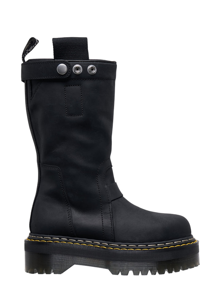 Rick Owens x Dr. Martens Quad Sole Pull On Boot in black leather with snap-tab collar strap, grosgrain pull tab, and chunky yellow-stitched platform sole