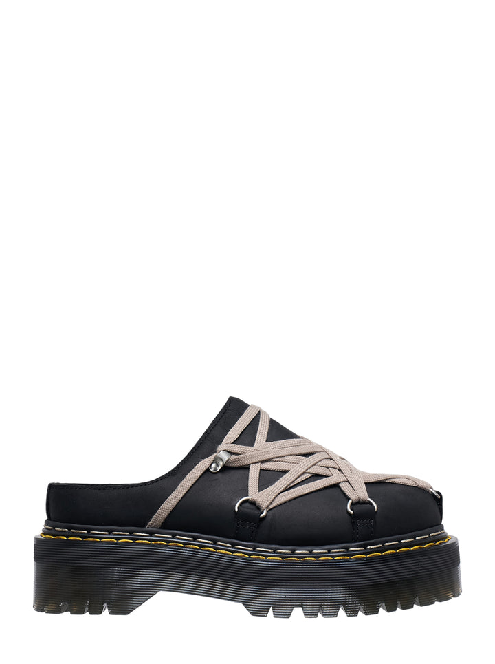 Rick Owens x Dr. Martens Quad Sole Megalace flatform mule in black with beige cord lacing, silver D-ring hardware, and chunky yellow-stitched cleated platform sole, side profile view