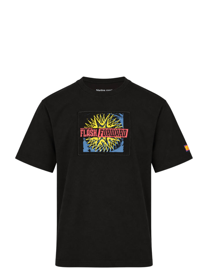 Martine Rose black short-sleeve T-shirt with a yellow, red and blue Flash Forward graphic patch on the chest