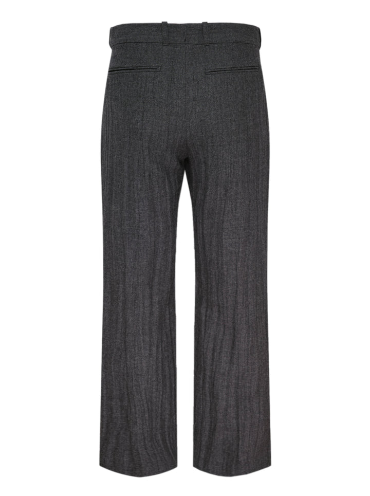 Our Legacy charcoal grey pleated slack trousers with a textured weave and straight-leg silhouette, shown from the front - view 2