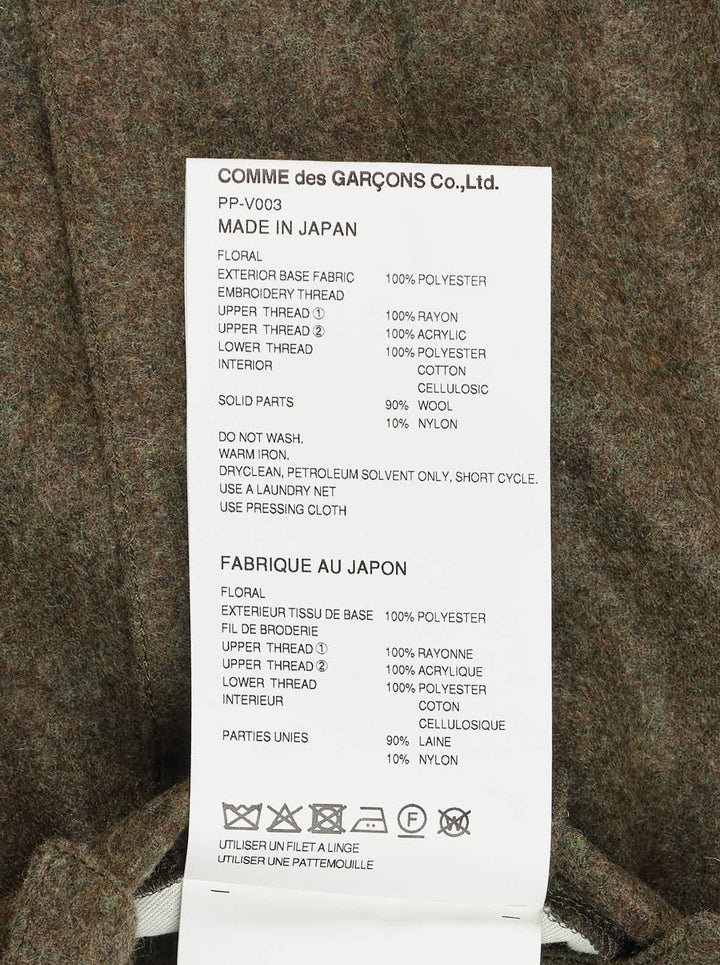 Comme des Garçons Homme Plus asymmetrical vest with an olive wool half, a multicolour embroidered floral half on black, and a large flap pocket - view 5
