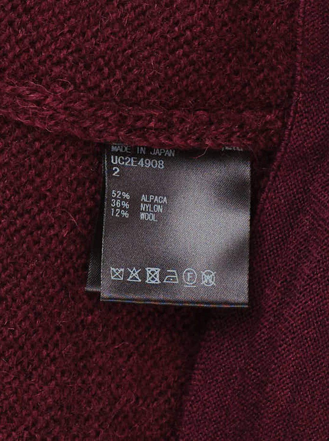 Undercover burgundy knit vest with ribbed V-neck and a horizontal zip pocket at the lower front - view 4