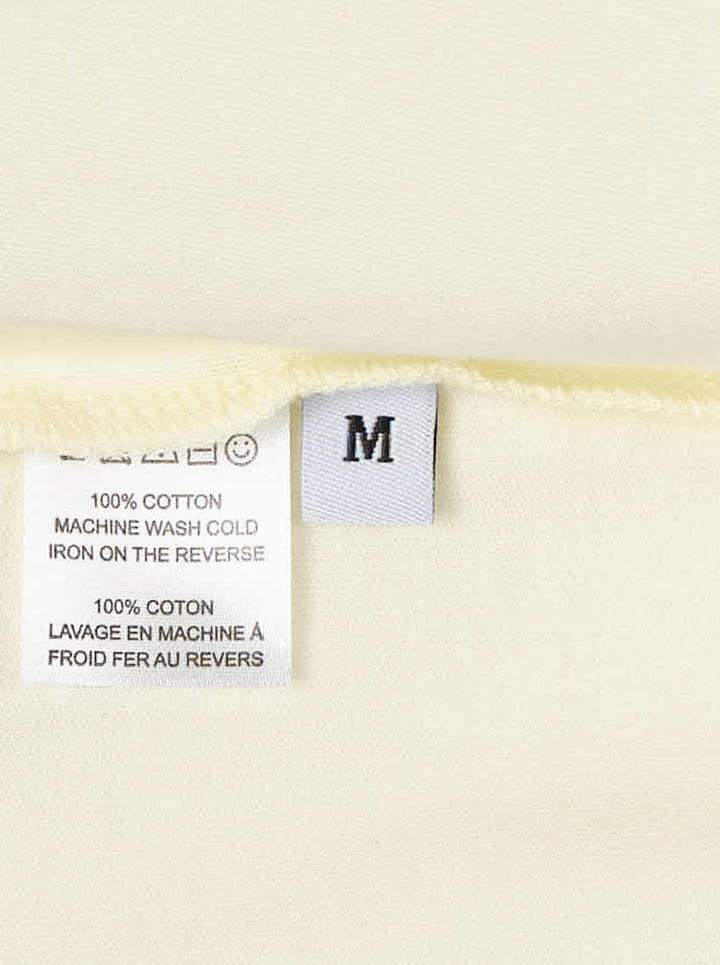 Ashley Williams Curtain T-Shirt in pale yellow with a pink satin ruffle yoke and bow detail at the chest - view 3