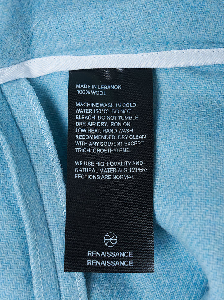 Sky blue asymmetric Claudia skort by Renaissance Renaissance with gathered fabric-covered button details and a cascading draped hem - view 3