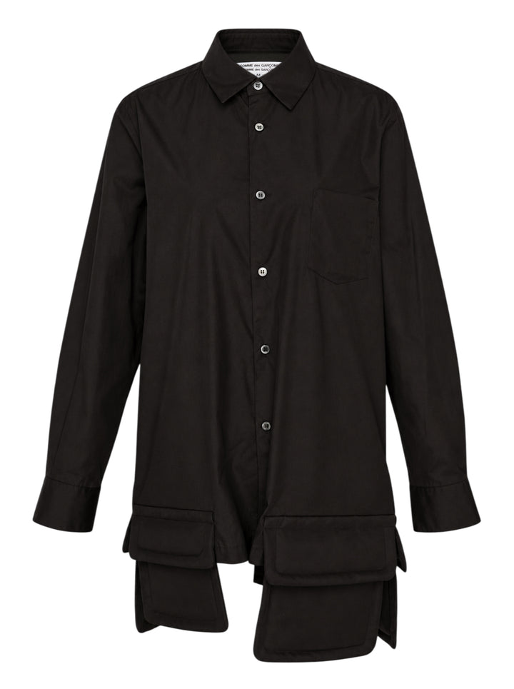 Black long sleeve shirt with asymmetric hem and padded flap pockets by Comme des Garçons Comme des Garçons