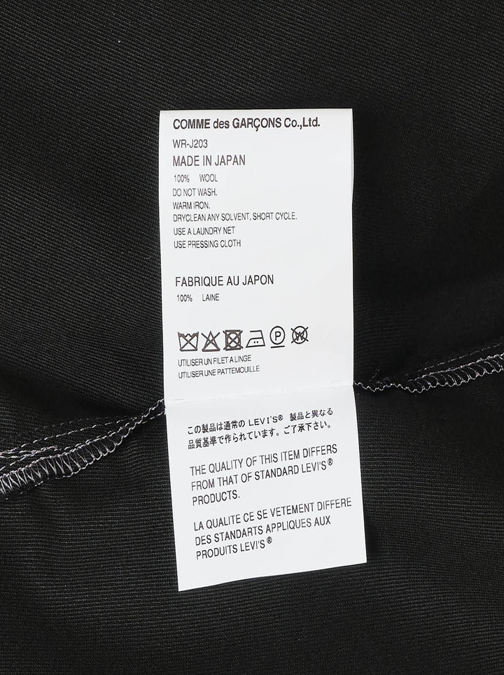 Junya Watanabe x Levi's black long-sleeve shirt with white contrast stitching, embroidered seagull motif across the chest, asymmetric chest pocket with red Levi's tab, and zip-detailed cuffs - view 3