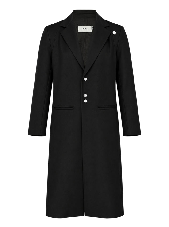 Black light wool long coat with notched lapels, snap button closure and jetted hip pockets, shown from the front