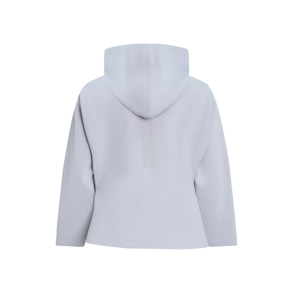 CFCL Milan Hoodie Flare Jacket in light grey, featuring a full-zip front, structured pointed hood, fitted torso with seam panelling, dramatic flared peplum hem, and ribbed cuffs - view 2