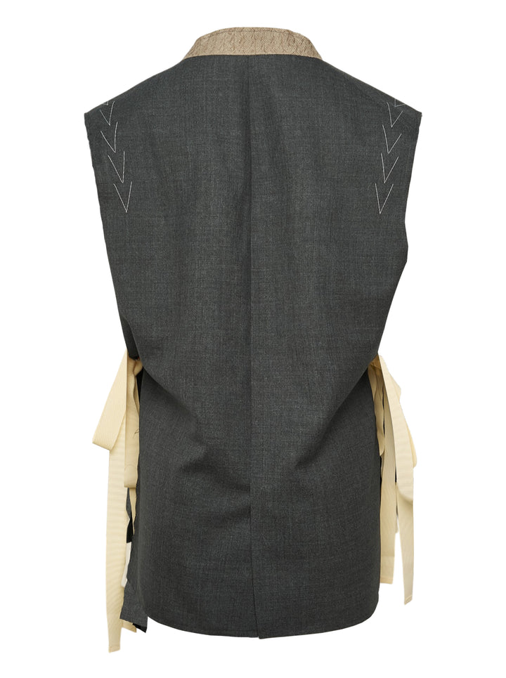 Sonia Carrasco Side Cut Blazer Vest in charcoal grey with open side panels revealing cream canvas interfacing and ribbon trim, notched lapel, and two-button front closure - view 2