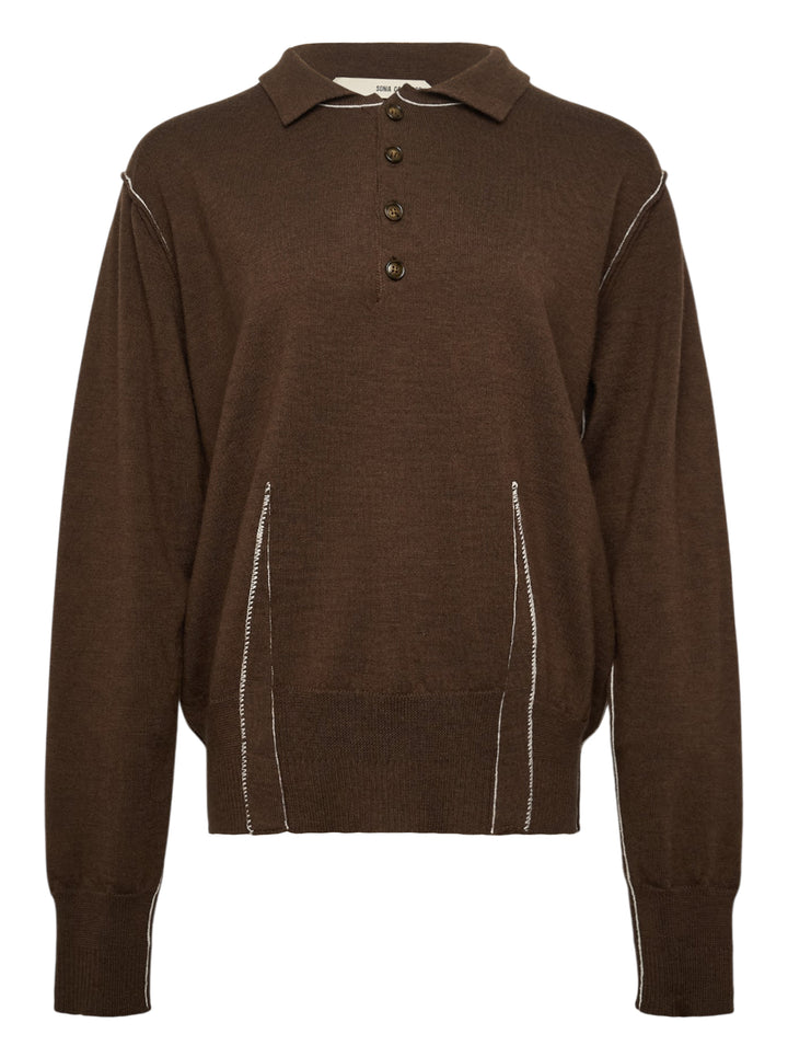 Sonia Carrasco Knit Polo Sweater in dark chocolate brown with contrast white overlock stitching along the seams, polo collar, four-button placket, and diagonal front pockets