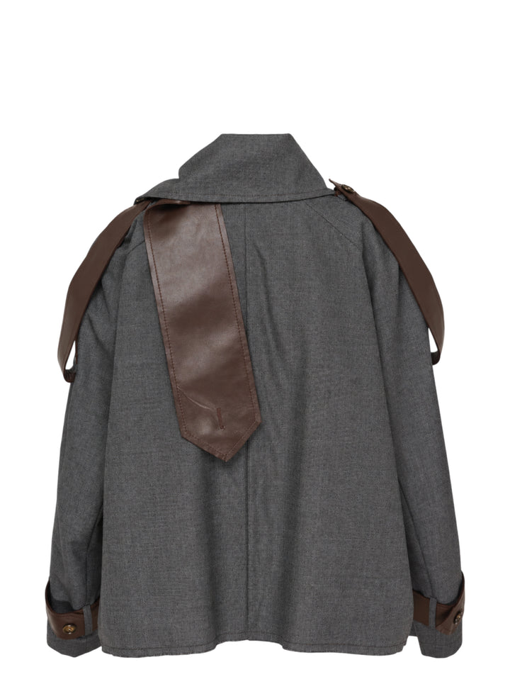 Sonia Carrasco cropped grey trench jacket with oversized pointed collar, button front and brown leather-look straps at the shoulders and cuffs - view 2
