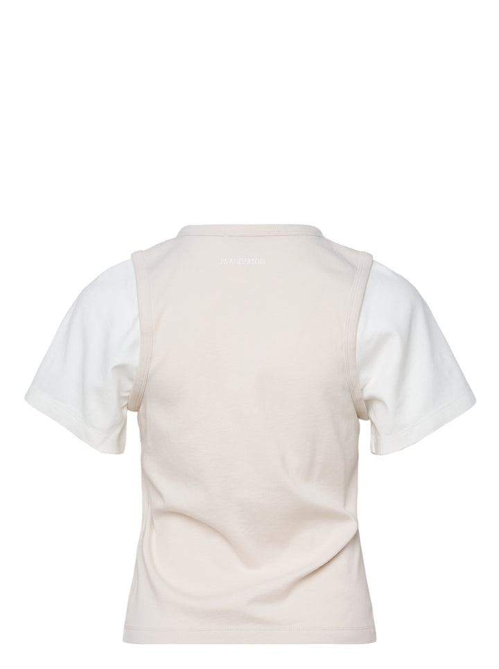 JW Anderson Double Layered T-Shirt with cream cotton body and contrasting white short sleeves, featuring a cut-out shoulder construction and crew neckline, displayed flat on a white background - view 2