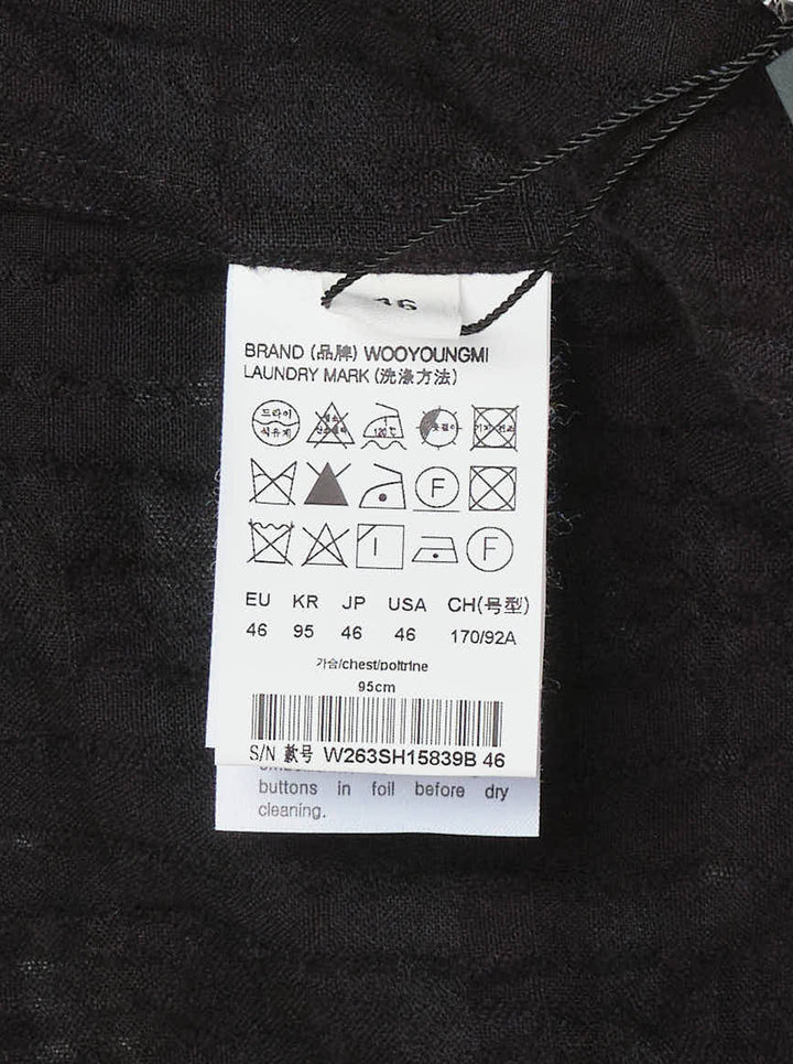 Wooyoungmi Crinkled Texture Long Sleeve Shirt in black, featuring a semi-sheer tonal plaid weave, button-down collar, chest patch pocket, and tone-on-tone Wooyoungmi Paris logo - view 3