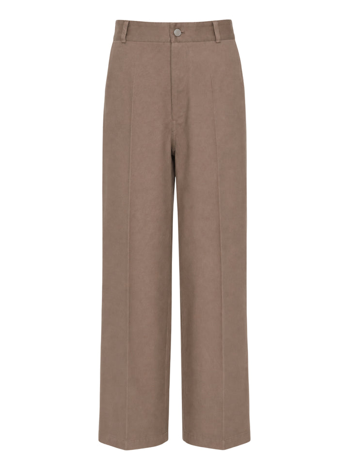 Lemaire Barrel Poly Cotton Pants in warm taupe, featuring a wide-leg silhouette, front pintuck seams, and a high-rise snap-button waistband