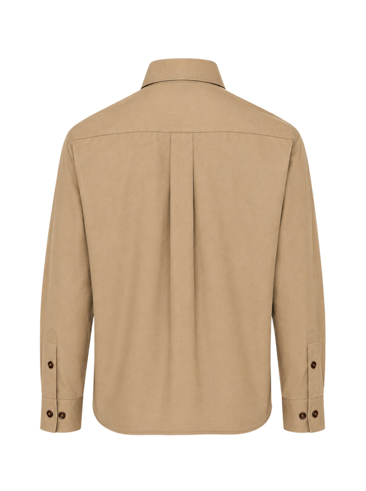 Lemaire Two Pockets Long Sleeve Shirt in tan cotton with dual patch chest pockets, dark tortoiseshell buttons, and a relaxed boxy silhouette, shown on a white background - view 2