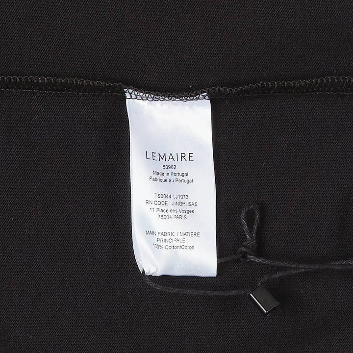 Lemaire Boxy Compact Cotton Tee in sand beige, featuring a relaxed oversized silhouette, crew neckline, and a single topstitched chest patch pocket