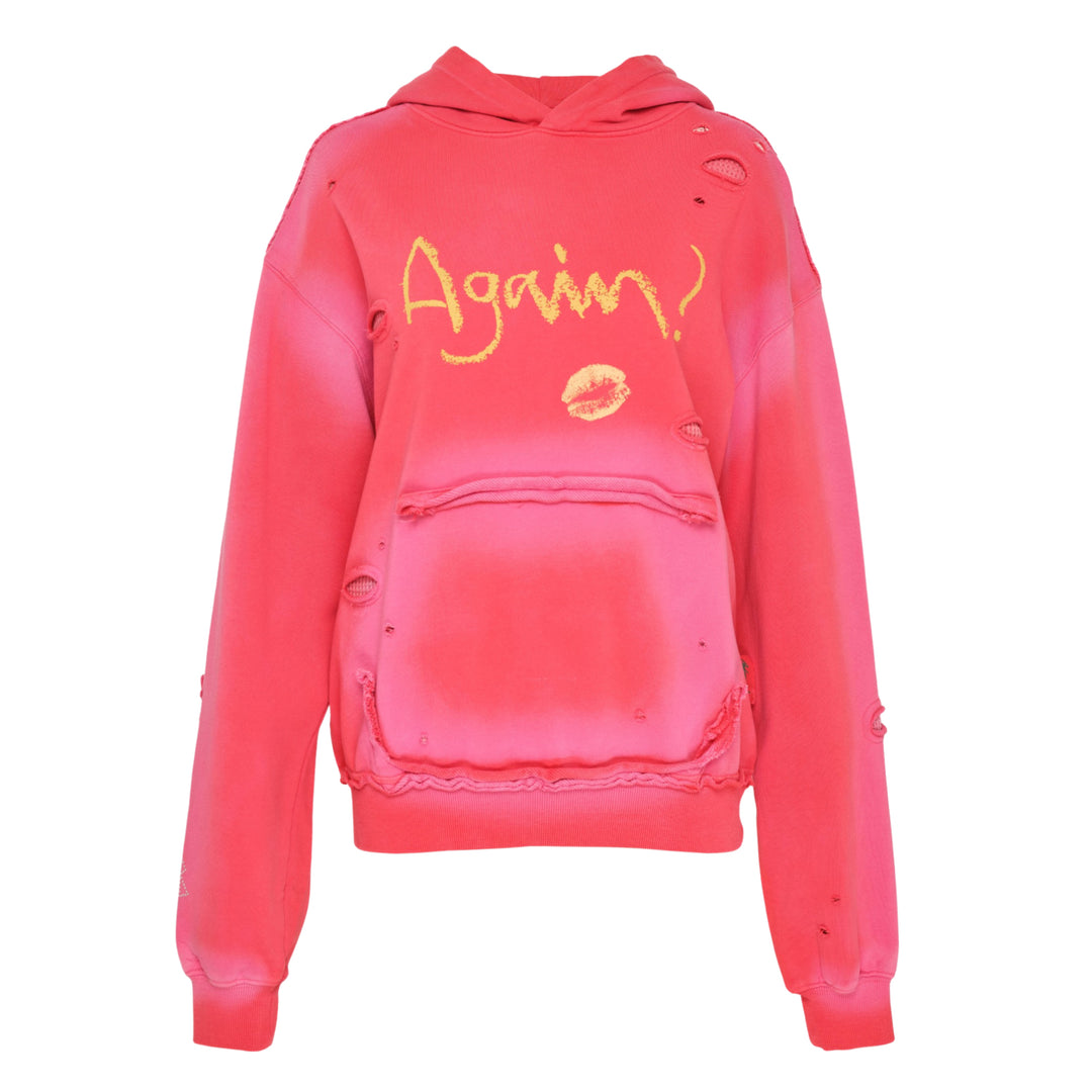 Andersson Bell unisex spray washed distressed hoodie in red with gold 'Again?' script graphic, lip-print motif, intentional slub holes, and raw-edge hem detailing — flat lay front view