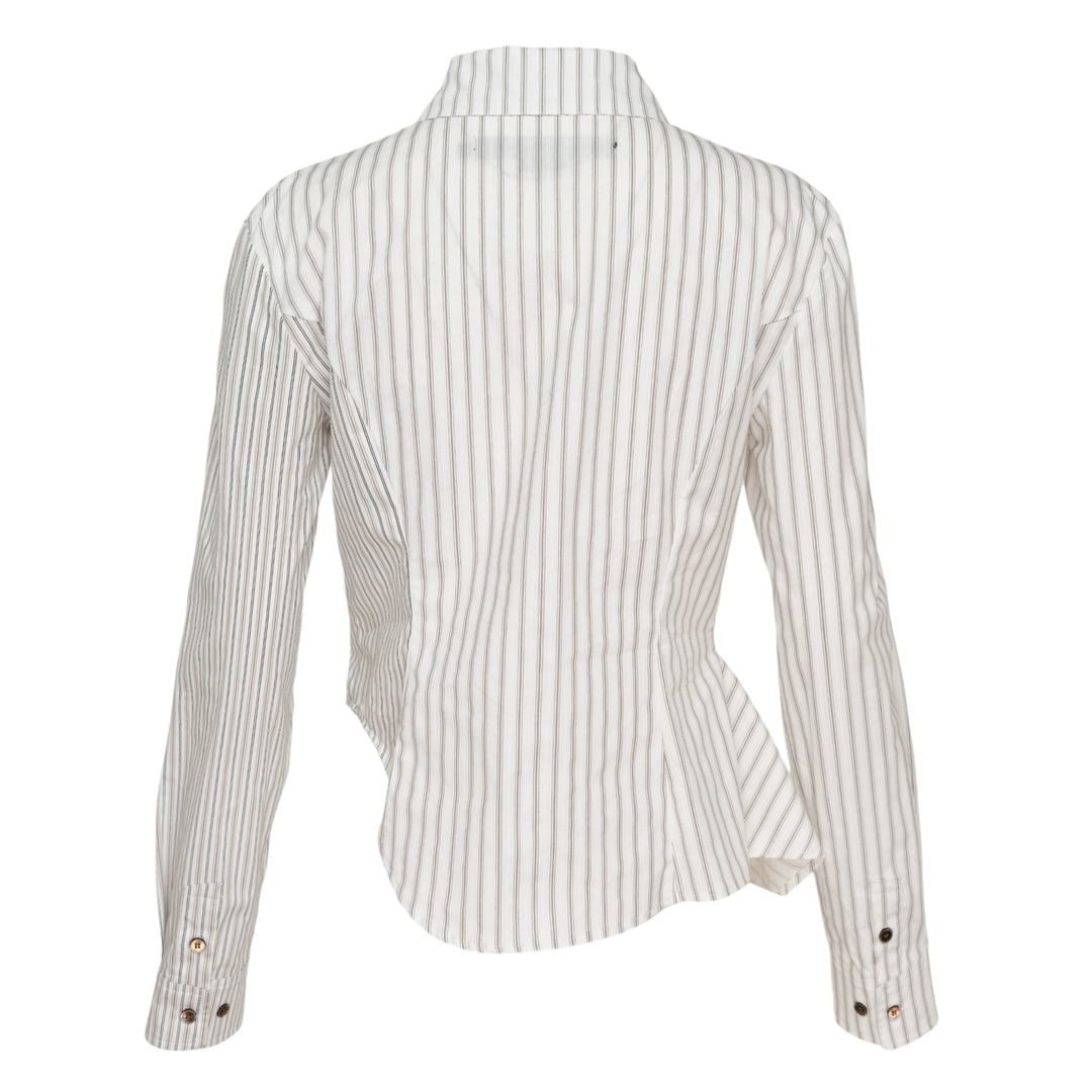 Andersson Bell Asymmetric Studded Stripe Shirt in white pinstripe with metallic stud button placket and draped asymmetric hem, flat lay on white background