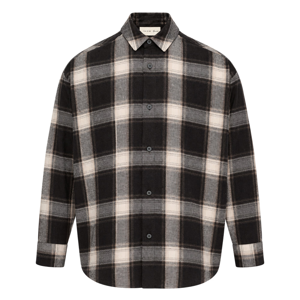 Fear of God Essentials long sleeve plaid button-up shirt in dark navy and grey windowpane check, relaxed oversized fit with concealed placket and tonal buttons, flat lay on white background