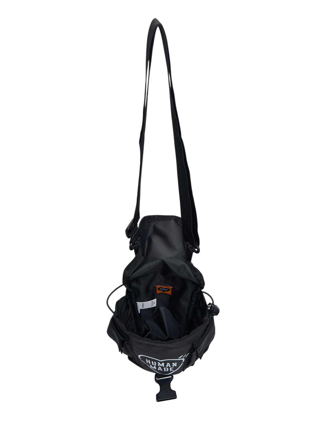Human Made Military Pouch #1 in black nylon, featuring woven webbing harness, dual D-ring attachments, buckle-release closure, and a detachable adjustable shoulder strap, shown on a white background - view 3