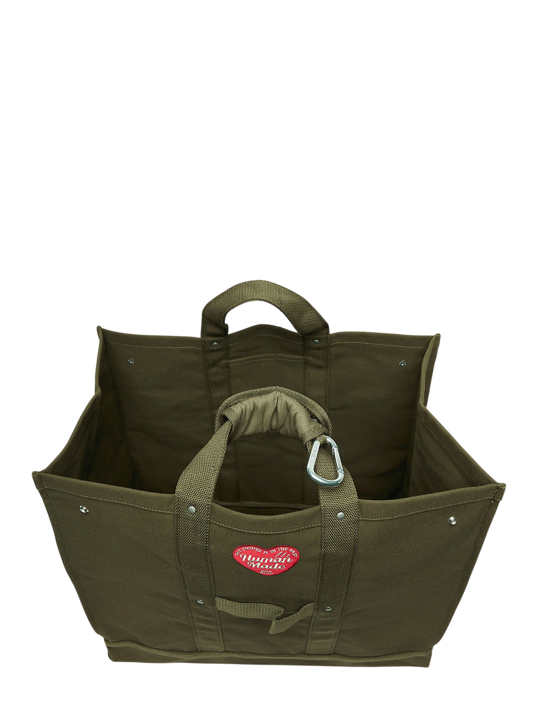 Human Made large olive green canvas tote bag with padded handles, silver carabiner clip, snap-button side tabs and red heart logo patch - view 3