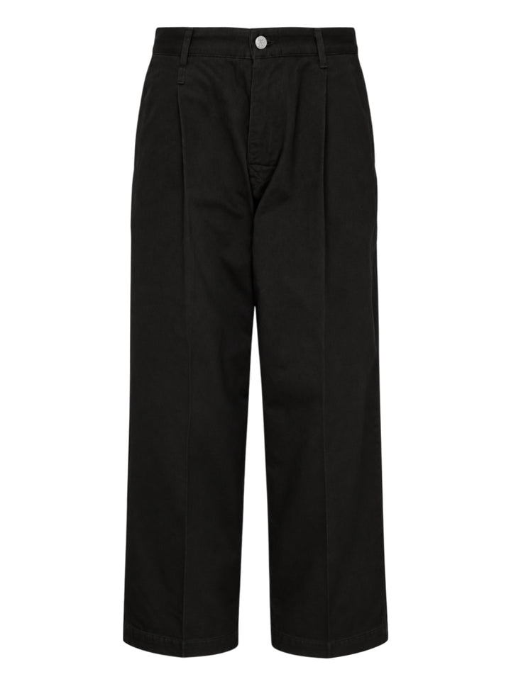 Human Made Skater Wide Leg Pants in black, featuring a high-rise waistband, double front pleats, and a relaxed wide-leg silhouette with stitched crease detail