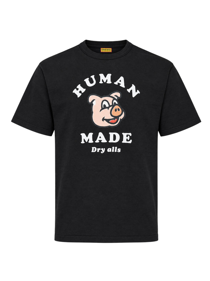 Human Made black short sleeve crew neck tee with smiling pig mascot graphic and arched 'Human Made Dry Alls' slogan print on the chest