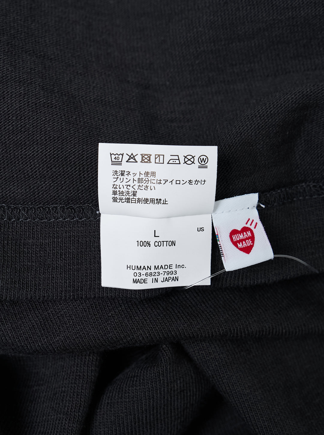 Human Made black short-sleeve graphic t-shirt featuring a tiger head crest, 'Dry Alls' circular slogan and painted-style Human Made lettering on the chest - view 3