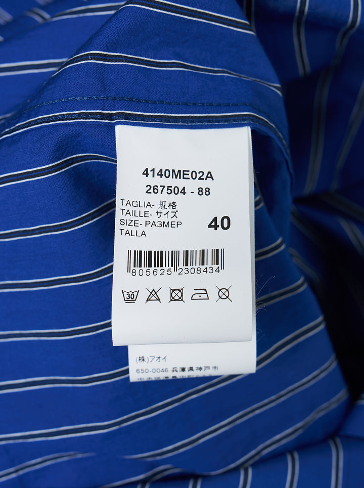 MSGM cobalt blue vertical-stripe oversized long sleeve shirt with an attached diagonal-stripe necktie integrated at the placket, featuring a button-down collar and branded cuff label - view 3