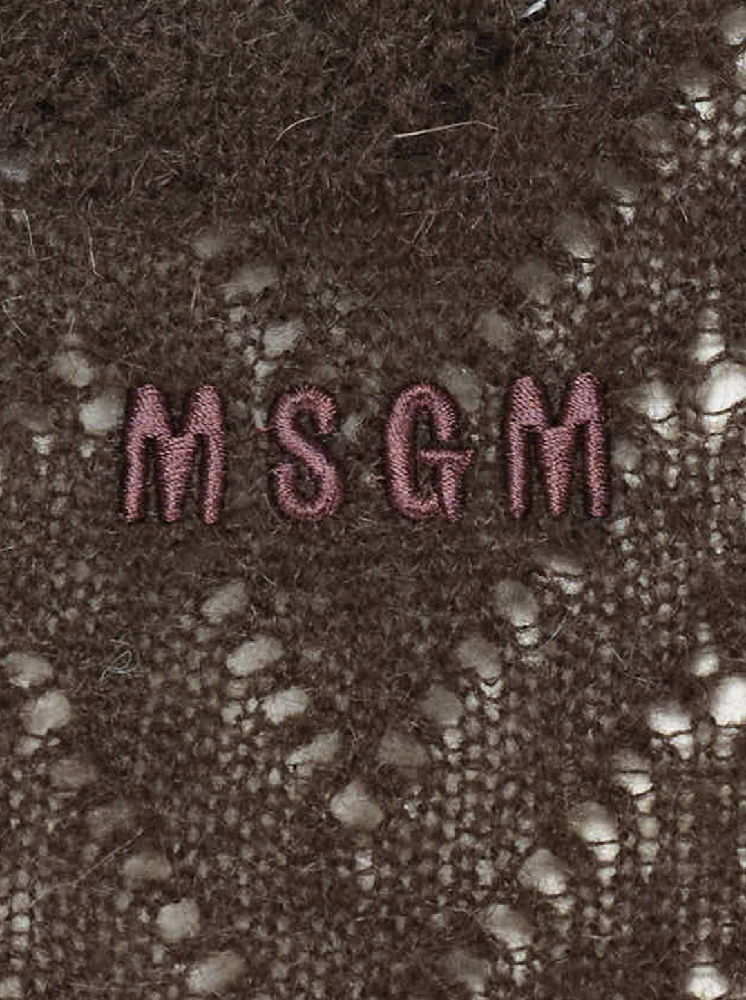 MSGM dark brown chevron pointelle knit midi skirt with ribbed waistband, pearl pin detail, and fluted ruffle hem trim, shown flat on white background - view 4