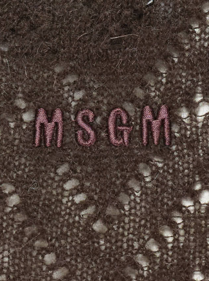 MSGM dark brown chevron pointelle knit midi skirt with ribbed waistband, pearl pin detail, and fluted ruffle hem trim, shown flat on white background - view 4
