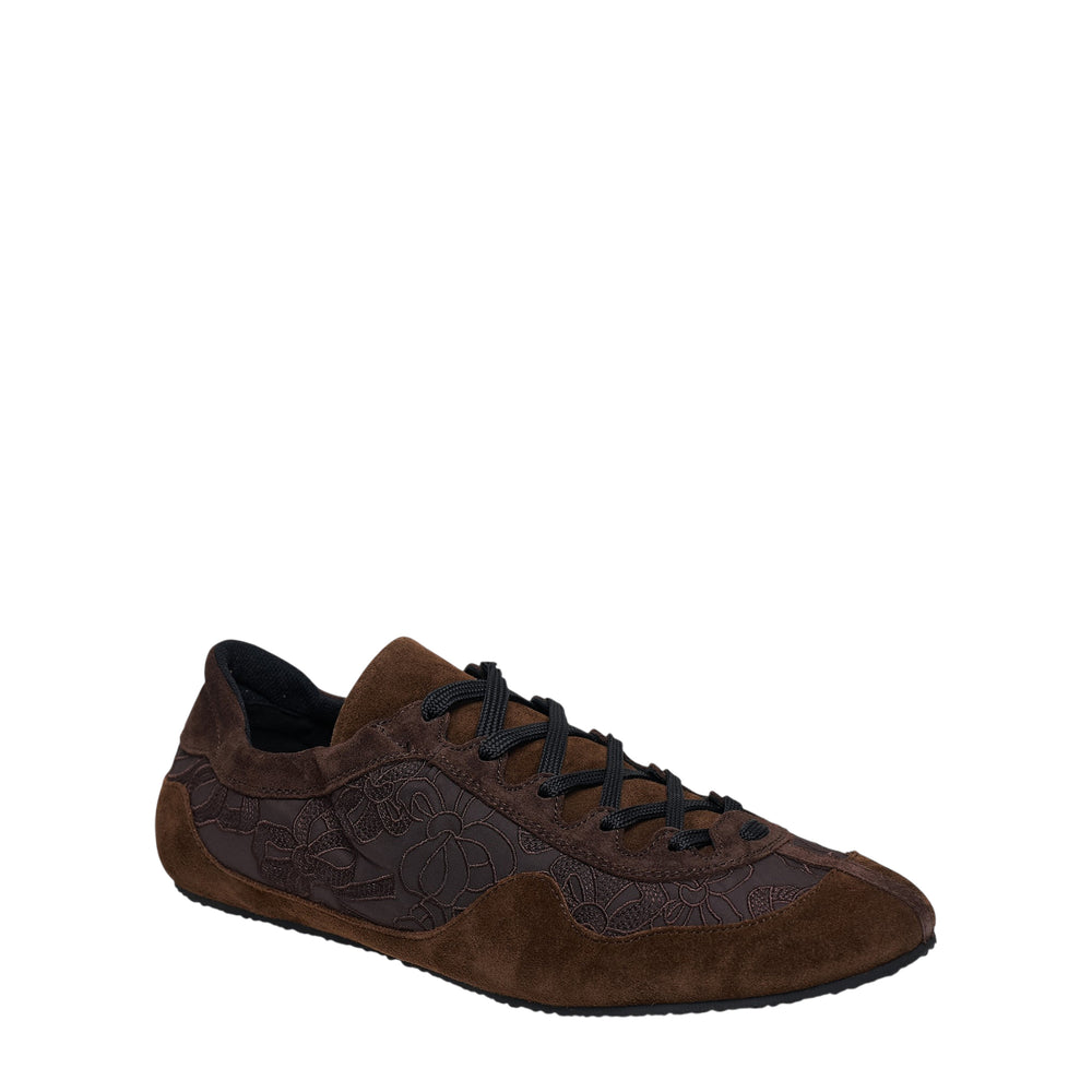 Cecilie Bahnsen Blaise soft sneaker in brown suede with tonal floral lace overlay panel and waxed cord laces, side profile view