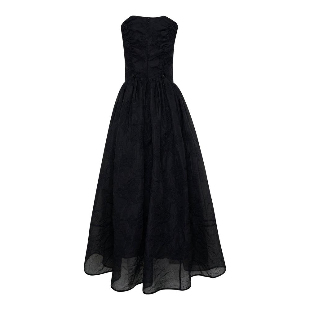 Cecilie Bahnsen Papillon Matelas strapless black organza ballgown with tonal floral embroidery and a dramatically full floor-length skirt, shown from the front against a white background