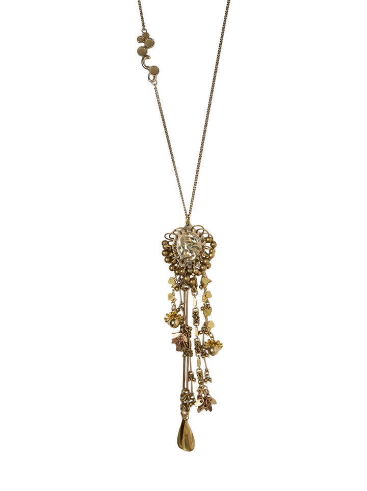 Dries Van Noten handmade gold-tone pendant necklace with ornate floral medallion centrepiece, cascading mixed charms, and long curb chain on white background - view 2