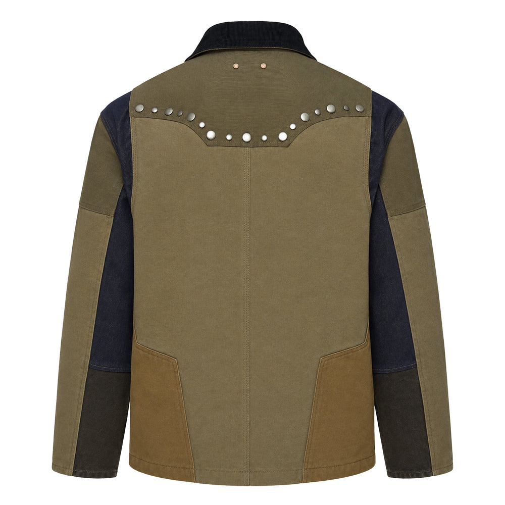 Andersson Bell Austin Patchwork Washed Jacket in khaki, olive, and indigo denim panels with silver stud yoke trim, snap-button placket, and black corduroy collar — front view