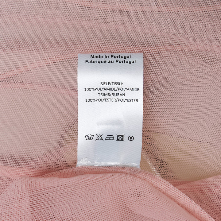 Simone Rocha blush pink sheer organza tulle midi skirt with gathered ruffle waistband and satin drawstring cord ties, front view on white background